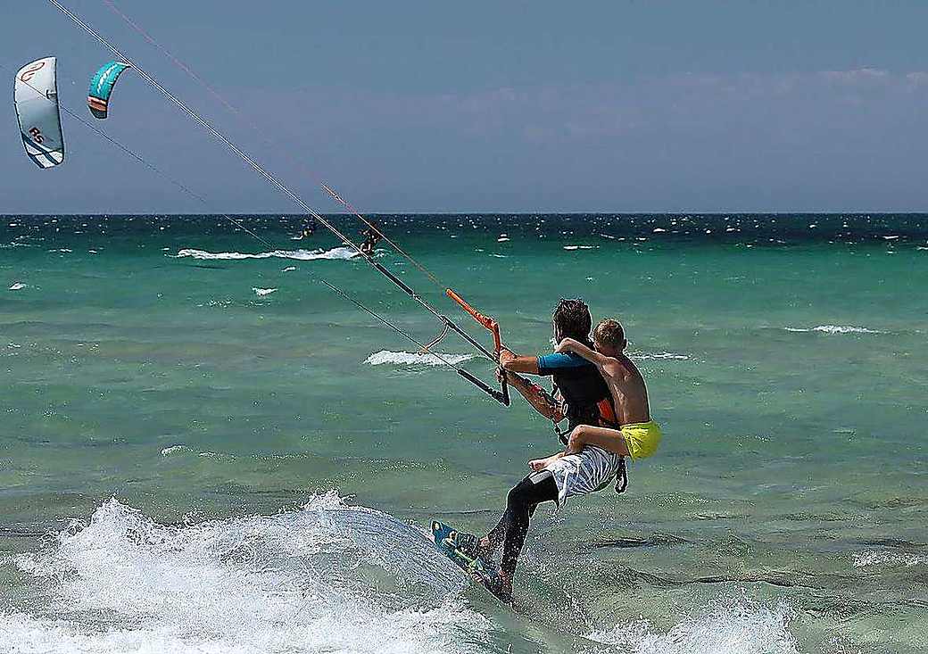 Kids kitesurf class on the beach at Paje, Zanzibar